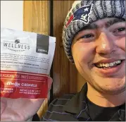  ?? ZAC MERCAUTO / AP ?? Zac Mercauto holds marijuana cookies in Fryeburg, Maine. Mercauto supports legalized marijuana and supported President Donald Trump.