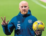  ??  ?? Liam Boyce with the match ball on Friday night