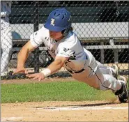  ?? GENE WALSH — DIGITAL FIRST MEDIA ?? La Salle’s Andrew Miles dives into home head first for a run Tuesday in the PIAA 6A semifinals.