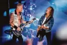  ?? Jungho Kim / Special to The Chronicle ?? Metallica’s James Hetfield (left) and Kirk Hammett perform on the first day of the BottleRock Napa Valley festival.
