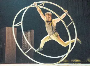  ?? CIMON PARENT MIRVISH.COM ?? Julien Silliau on the German wheel, part of Reversible, by the Montreal circus troupe 7 Fingers.