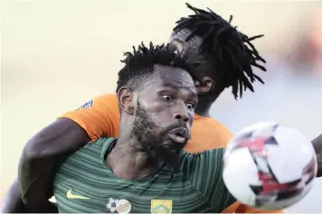  ?? | HASSAN AMMAR AP ?? THULANI HLATSHWAYO’S aerial strength in the box was too much for Ivory Coast to handle on Monday.