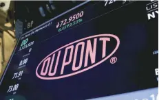  ??  ?? The Dupont logo is displayed on a board above the floor of the New York Stock Exchange in New York. — Reuters