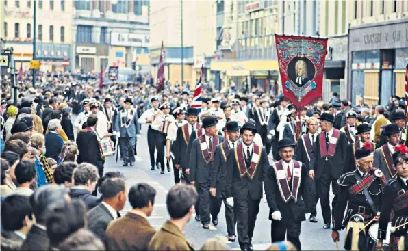  ?? ?? An Orange Order march in Belfast in 1969, and below, pro-Palestinia­n protesters in London last month