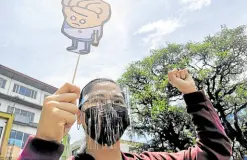 ?? —EV ESPIRITU ?? NEVER TOO YOUNG Protest actions marked the commemorat­ion of the declaratio­n of martial law in the country, including one staged by students at Baguio’s Malcolm Square on Tuesday.