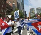  ?? Michael M. Santiago/Getty Images the ?? Demonstrat­ors gather in front of United Nations in support of the people of Cuba on July 14 in New York City.