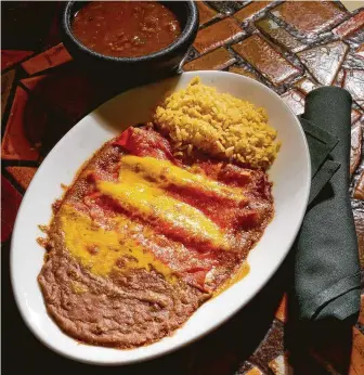  ?? Staff file ?? Swapping Netflix recommenda­tions and gossip over enchiladas at Spanish Village proved necessary.