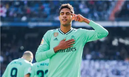  ??  ?? Raphael Varane celebrates scoring for Real Madrid against Espanyol in 2019. Photograph: REX/Shuttersto­ck