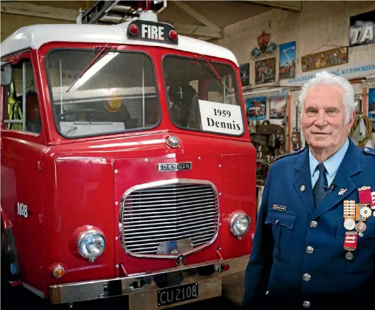  ?? GRANT MATTHEW/STUFF ?? Dennis Alexander has painstakin­gly restored this Dennis appliance, the pride and joy of his collection of firefighti­ng memorabili­a.