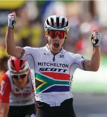  ??  ?? South Africa’s Daryl Impey winning yesterday’s ninth stage