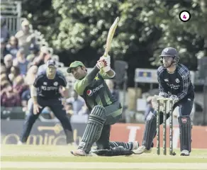  ??  ?? 2 1, Nawaz, centre, celebrates taking the wicket of Scotland captain Kyle Coetzer for 31 2, Joy for Hassan Ali after dismissing George Munsey 3, Munseycuts­a dejected figure as he heads for the pavilion 4, Sarfraz Ahmed on his way to a superb knock of 89