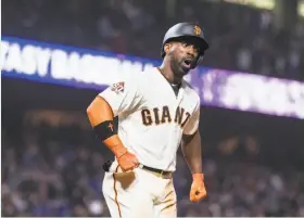  ?? John Hefti / Associated Press ?? Giants right fielder Andrew McCutchen reacts after hitting a three-run home run — his sixth hit of the game — for a walkoff win over the visiting Dodgers.