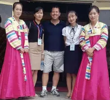  ?? Picture: SUPPLIED ?? Neil Kirby with North Korean tour guides.