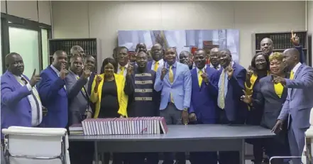  ?? ?? Unparliame­ntary ... CCC leader Nelson Chamisa (standing in front fifth from left) with some of the opposition party MPs who attended parliament this week.