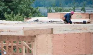  ?? CP FILE PHOTO ?? A new home was under constructi­on in North Vancouver on June 12.