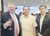  ??  ?? Bruce Peoples with Toyota Cebu City Inc.’s Jose Cuenco and Christian Vincent Cuenco.