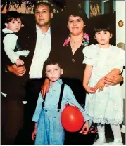  ?? COURTESY OF HARTWIG FAMILY ?? Richard Hartwig and Mercedes Hartwig with their children, from left, Edward, Rene and Naomi, taken in 1992. The couple met while working for Tandy Corp. in the late 1980s.