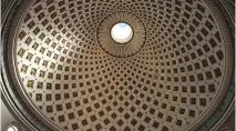  ??  ?? The high-domed ceiling of the Mosta Dome church in Mosta was bombed during the Second World War but miraculous­ly remained intact.