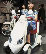  ??  ?? Urban travel: Many South Koreans view electric scooters as an effective way to commute. — AFP