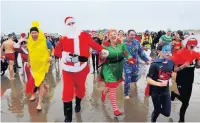  ??  ?? The Porthcawl Christmas Day Swim will be held for the 55th time this year