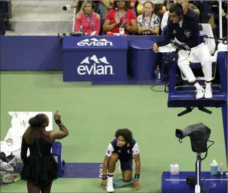  ?? SETH WENIG — THE ASSOCIATED PRESS ?? The indelible image from last year’s U.S. Open does not involve anyone holding a trophy or making a remarkable shot. It was Serena Williams, left, pointing a finger at chair umpire Carlos Ramos, right, as she insisted he owed her an apology.