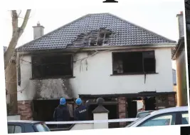  ?? ?? Blaze: The couple’s home in Portmarnoc­k after the fire