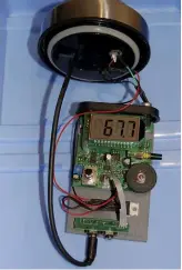  ??  ?? Temperatur­e stability is vital, hence the magnetomet­er (left) is housed in a vaccuum flask (centre), which is kept inside cool box (right)