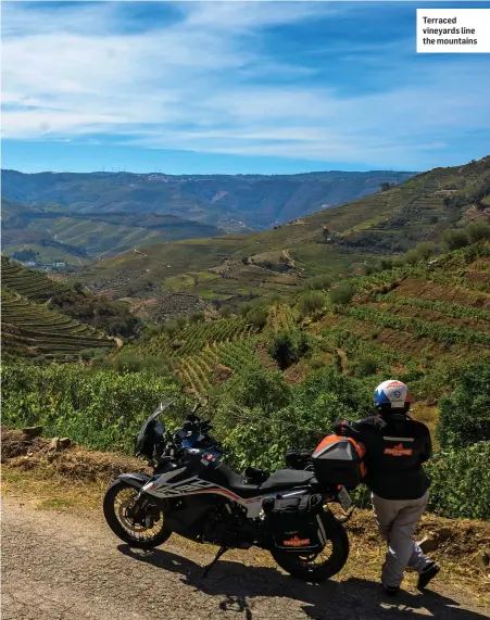  ?? ?? Terraced vineyards line the mountains