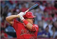  ?? The Associated Press ?? BIG CONTRACTS: Los Angeles Angels’ Mike Trout bats during the first inning of the team’s July 25, 2019, baseball game against the Baltimore Orioles in Anaheim, Calif.