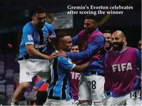  ??  ?? Gremio’s Everton celebrates after scoring the winner
