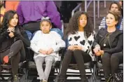  ?? John Salangsang I nvision/ Associated Press ?? FROM LEFT, Vanessa, Gianna and Natalia Bryant and Sofia Laine in 2015 at Staples Center. Laine is suing her daughter for f inancial support.