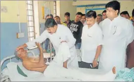  ?? PTI ?? Congress leader Bharatsinh Solanki visits an injured Amarnath pilgrim in Surat on Wednesday.