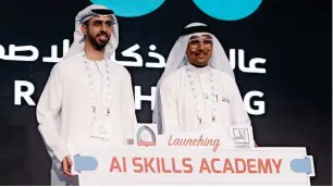  ?? Photos by Juidin Bernarrd ?? omar bin sultan al olama and Dr abdullatif M. al shamsi present the ai skills academy at the ai everything summit in Dubai on tuesday. —
