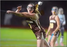  ?? TIM MARTIN/THE DAY ?? Stonington’s Hannah Pratt reaches up and attempts to deflect a pass during the first half of Tuesday night’s Class S state field hockey semifinal game against North Branford at East Lyme. The No. 4 Bears were eliminated by the top-seeded and unbeaten...