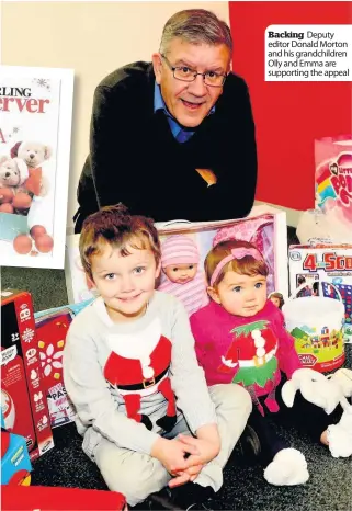  ??  ?? Backing Deputy editor Donald Morton and his grandchild­ren Olly and Emma are supporting the appeal