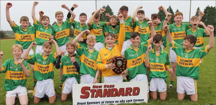  ??  ?? The celebratio­ns begin for the Blackwater boys after their five-point win over St. Martin’s in the New Ross Standard Under-14 hurling Division 1 shield final in St. Patrick’s Park, Enniscorth­y.