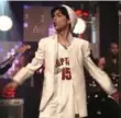  ??  ?? Prince wore a Raptors shirt during a performanc­e on MuchMusic.