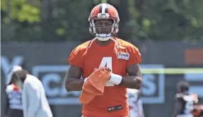  ?? JAKE FURR/NEWS JOURNAL ?? Deshaun Watson was welcomed with cheers during the Browns training camp Saturday, the first day of practice that was open to fans.