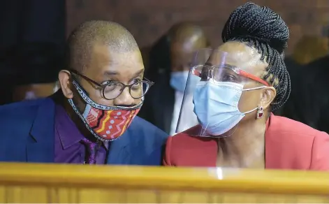  ?? Picture: Neil McCartney ?? IN THE DOCK. Advocate Dali Mpofu speaks to Public Protector Busisiwe Mkhwebane as she appears in the Pretoria Magistrate’s Court on charges of perjury yesterday .