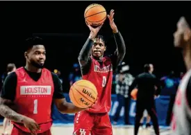  ?? Brett Coomer/Staff photograph­er ?? Jim “Mattress Mac” McIngvale bets $2.5 million on UH guard Marcus Sasser and the Cougars winning it all in the men’s NCAA Tournament.