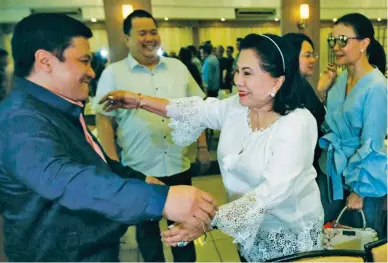  ?? (Mark Balmores) ?? OUT ON BAIL – Former Senator Jinggoy Estrada (left) is welcomed by his mother Dr. Loi Ejercito and sister Jacky (right) in a restaurant in San Juan City after he was allowed by the Sandiganba­yan to post P1.330-million bail for plunder and graft charges...