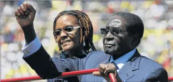  ?? Picture: REUTERS ?? DEFIANT: Zimbabwe President Robert Mugabe and his wife Grace arrive for his inaugurati­on in Harare yesterday.