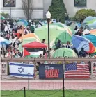  ?? CHARLY TRIBALLEAU/AFP VIA GETTY IMAGES ?? Police have intervened in some protests on college campuses as dissatisfa­ction deepens with the nation’s support for Israel in the nation’s war against Hamas militants.