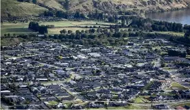  ?? STUFF ?? Inclusiona­ry zoning enabled the Queenstown Lakes Community Housing Trust to build 27 homes in Lake Hayes Estate.