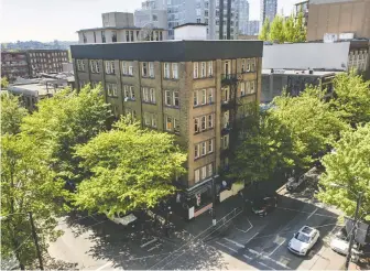  ?? JASON PAYNE ?? The building at 303 Columbia St. is an SRO hotel run by Atira in the Downtown Eastside. An Ernst & Young report details how, without B.C. Housing's approval, Atira used $2 million in surplus to buy the building.