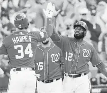  ?? JOHN BAZEMORE THE ASSOCIATED PRESS ?? Washington’s Bryce Harper celebrates a spring-training home run against Detroit on Sunday in West Palm Beach, Fla.