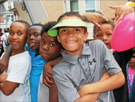  ?? MICHILEA PATTERSON — DIGITAL FIRST MEDIA ?? Kids enjoy National Night Out festivitie­s at the Washington Street Park in Pottstown Tuesday evening. It was one of many gatherings held throughout the region to honor law enforcemen­t, fight crime and bolster community spirit.