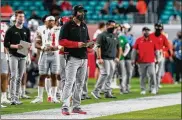  ?? ASSOCIATED PRESS ?? Ohio State coach Ryan Day, in addition to finding a quarterbac­k, will attempt to fix a defense that was less than stellar in 2020. Part of that involves hiring a coach to replace the retiring Greg Mattison.