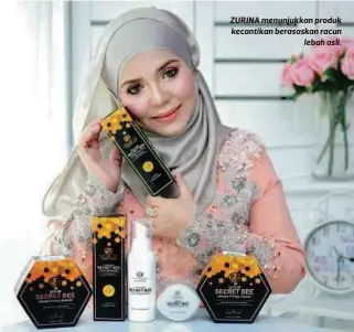  ??  ?? ZURINA menunjukka­n produk kecantikan berasaskan racun
lebah asli.