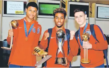  ??  ?? England Under-17’s (from left) Rhian Brewster, Angel Gomes and Philip Foden pose during the homecoming for the England team after their victory in the FIFA Under-17 World Cup Final. — Reuters photo